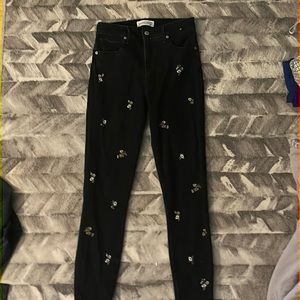 Black Abercrombie and Fitch jeans with embroidered flowers